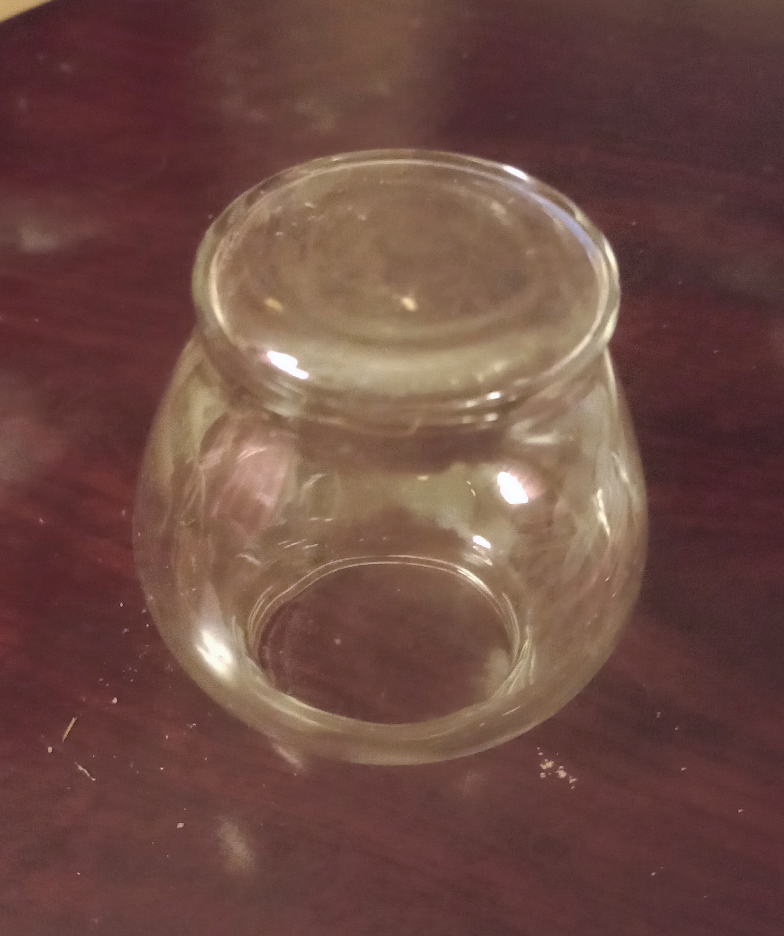 Small, clear glass vase, often referred to as a fishbowl vase or bud vase H=80mm D=100mm
