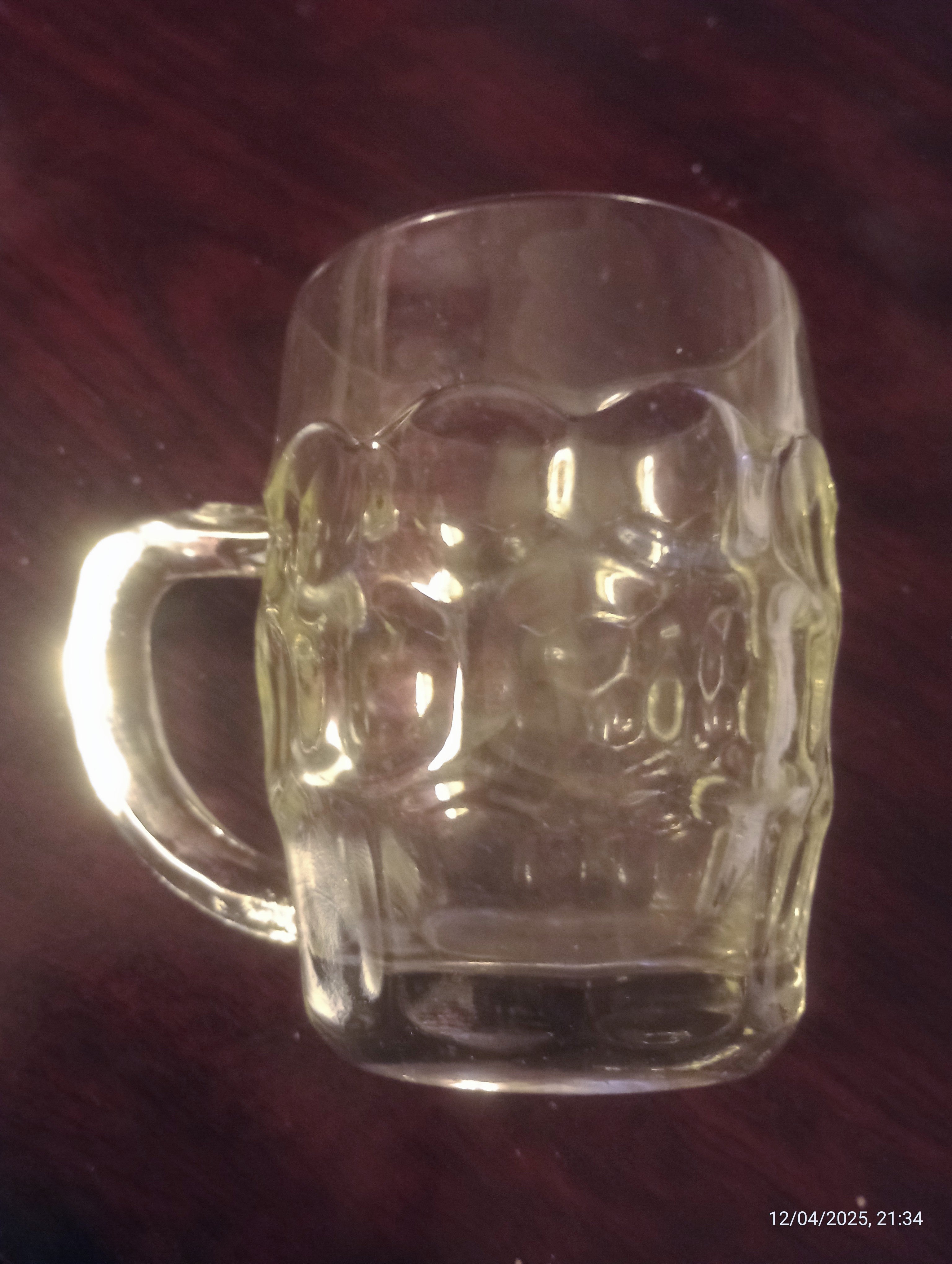 Traditional British-style dimpled beer tankard, also commonly known as a dimple mug, jug glass