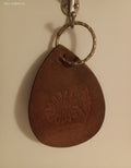 Hand-tooled leather keychain or bag charm