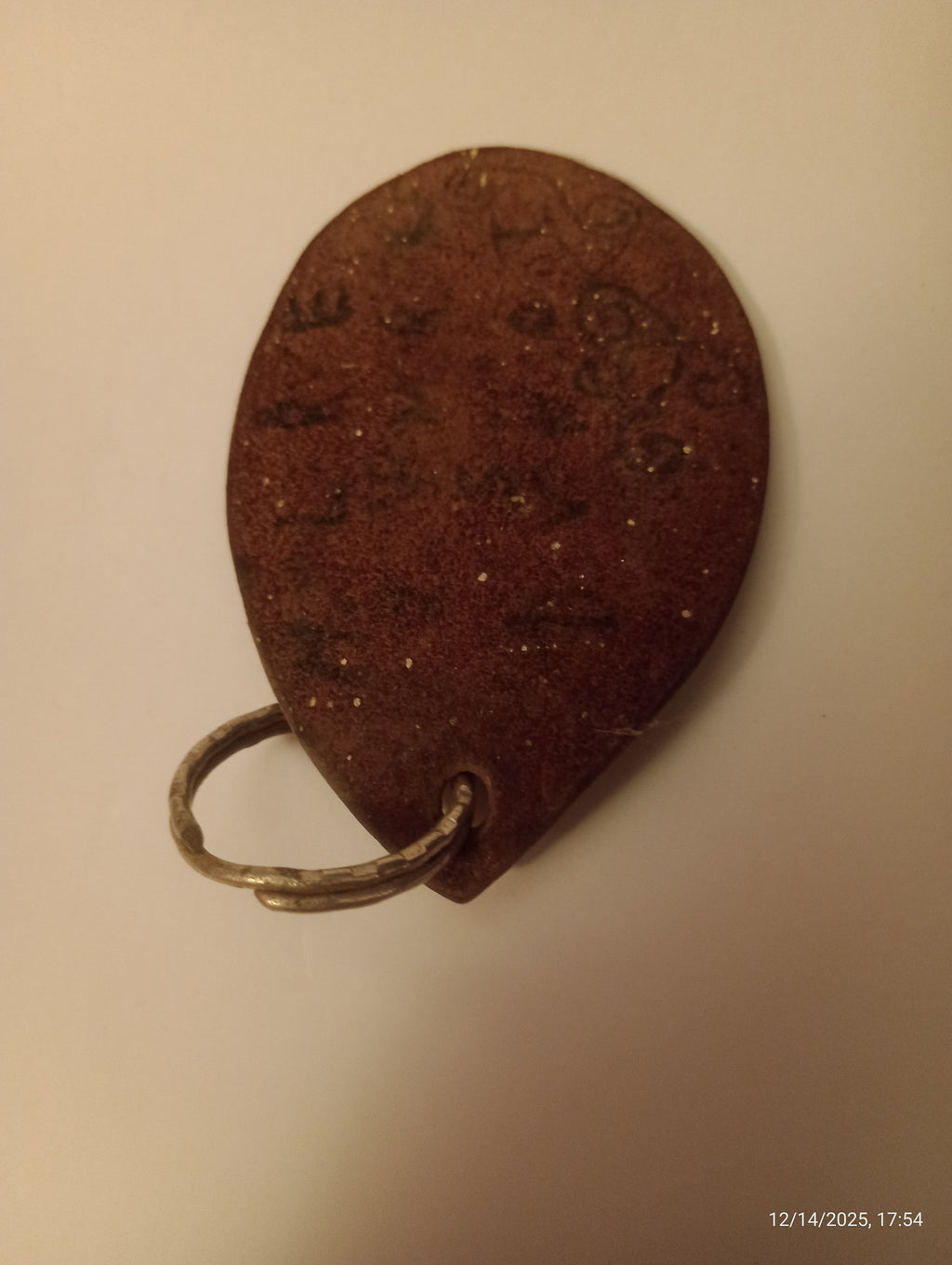 Hand-tooled leather keychain or bag charm